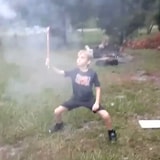 Guy Lets His Kid Play With A Roman Candle Firework, Quickly Regrets It